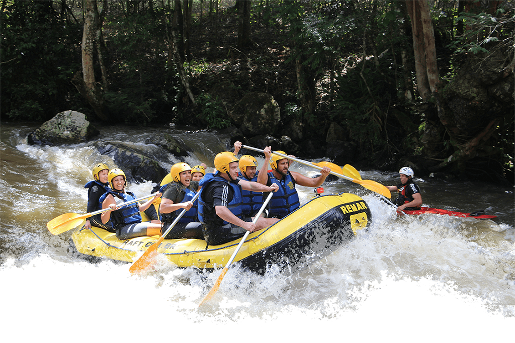 people enjoying white water rafting